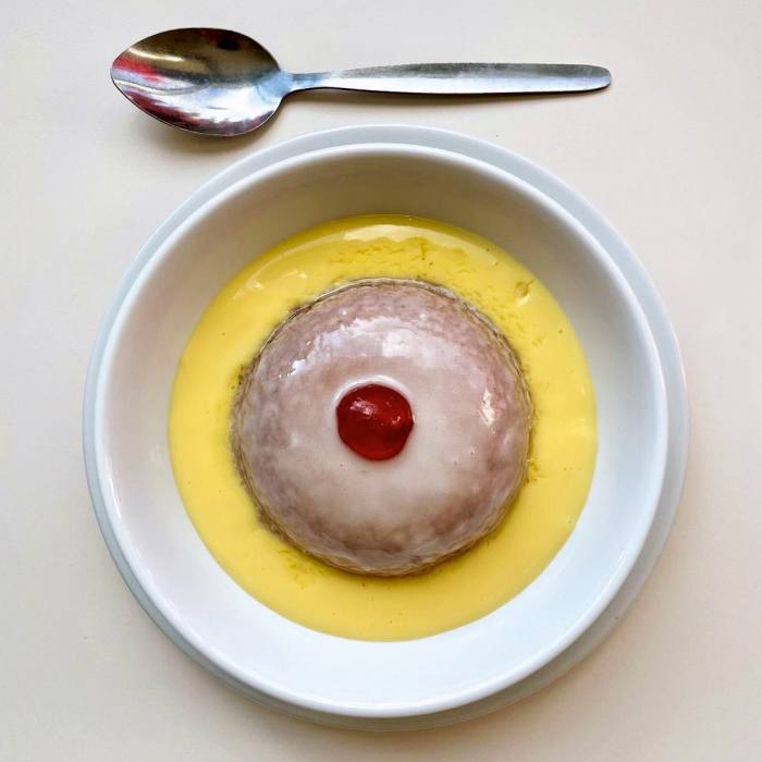 Cherry bakewell sponge with custard at Norman’s Café