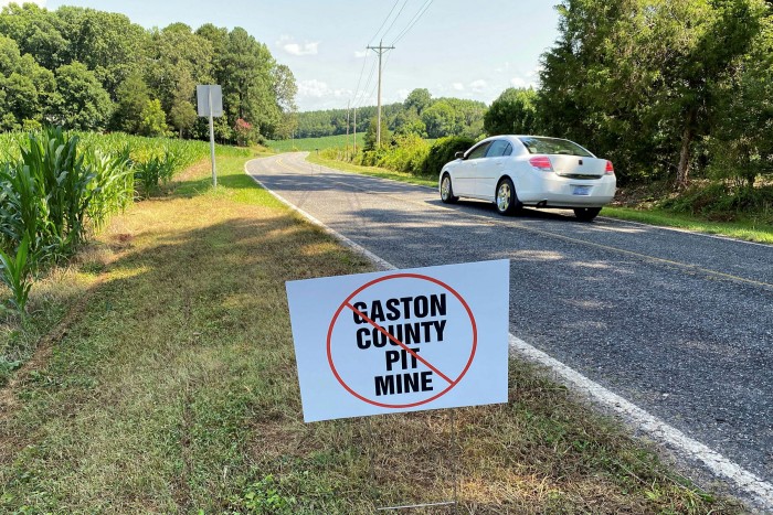 A sign planted by opponents of Piedmont Lithium’s planned mine on a roadside in Gaston County, North Carolina
