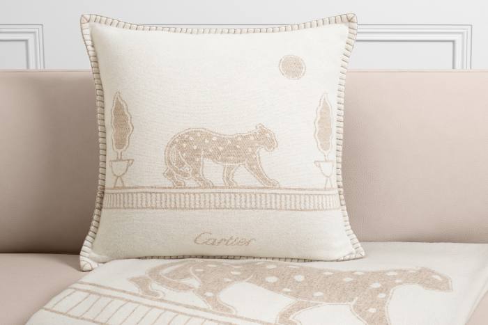Cartier Panthère de Cartier merino wool and cashmere cushion, £430, and blanket, £1,100