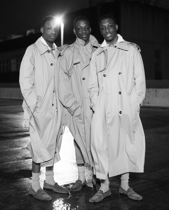 Students and triplets Ayobami, Ayooluwa and Ayokunle Oyesanwo, 16, from left: Ayobami wears Burberry gabardine coat, £2,290. Barbarian Sportswear cotton rugby shirt (just seen), £95. LEJ cotton shirt (just seen), £275. John Lobb suede loafers, £1,310. Paul Smith cotton/silk socks, £41. Ayooluwa wears Burberry gabardine coat, £2,290. Fendi cotton shirt (just seen), £1,050. Manolo Blahnik suede loafers, £725. Paul Smith cotton/silk socks, £41. Ayokunle wears Burberry gabardine coat, £2,290. Barbarian Sportswear cotton rugby shirt (just seen), £95. LEJ cotton shirt (just seen), £275. John Lobb suede loafers, £1,310. Paul Smith cotton/silk socks, £41