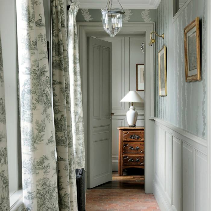 The hotel is decorated with antiques and toile de Jouy details