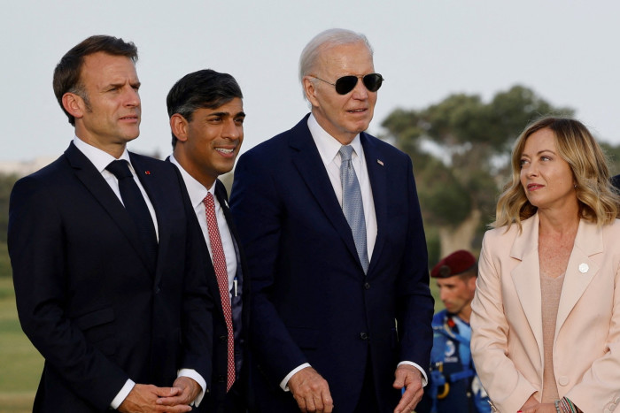 British Prime Minister Rishi Sunak, second left,  with French President Emmanuel Macron, left, US President Joe Biden, centre, and Italian Prime Minister Giorgia Meloni, right, at the G7 summit