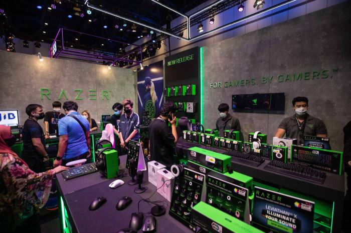 Visitors seen inside the Razer booth at the Thailand Game Show 2022