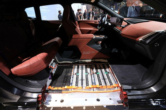 A cutaway reveals the battery pack of a BMW iX electric SUV