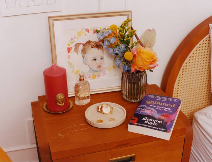 Her bedside table with a Fahren Feingold portrait of her daughter