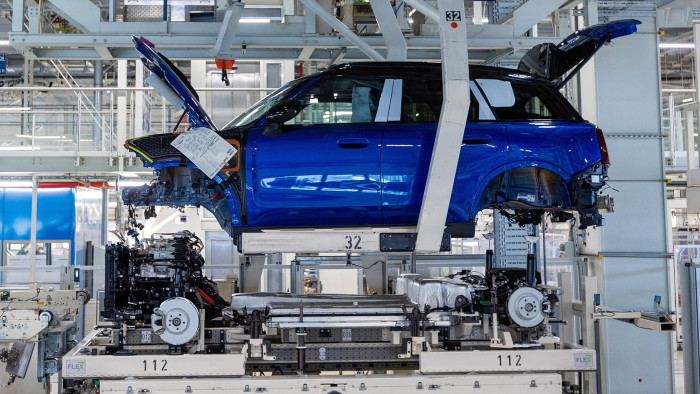 An all-electric Mini Countryman on the assembly line in the BMW Group factory in Leipzig, Germany