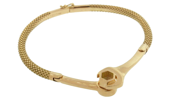 A Luis Morais 14ct gold bracelet with a wrench-like clasp