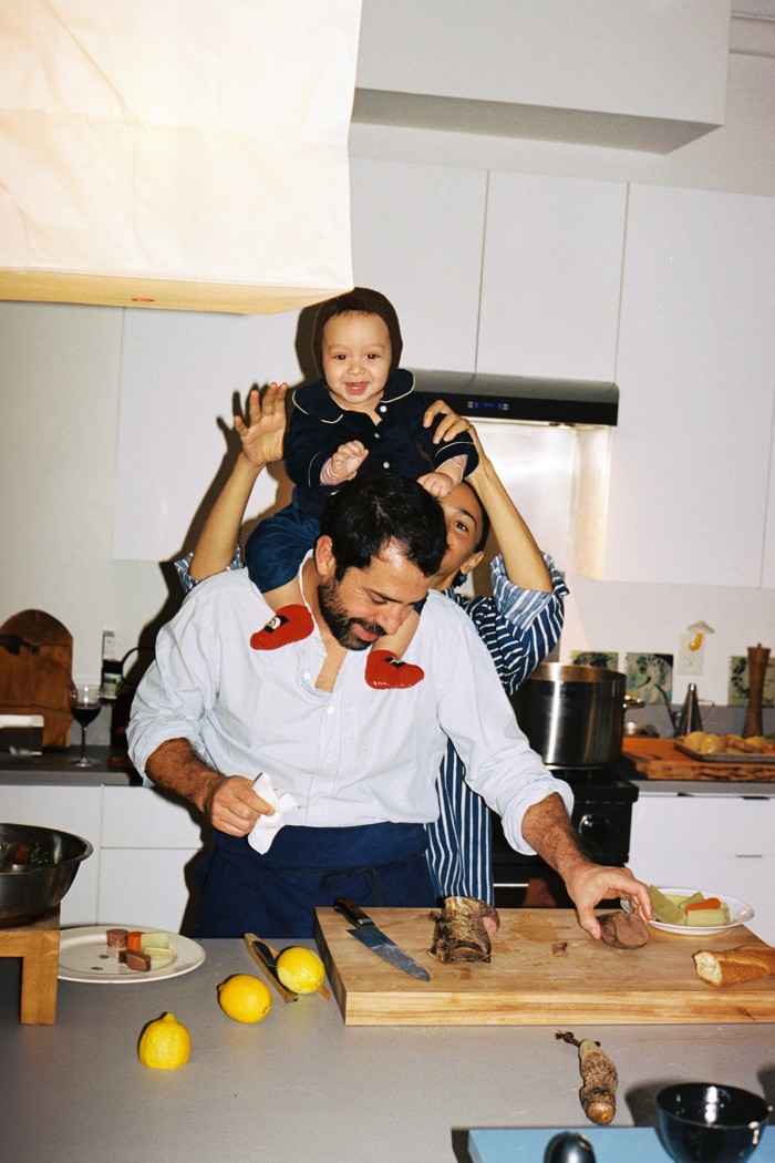 Gohar, Ignacio and baby Paz in the kitchen