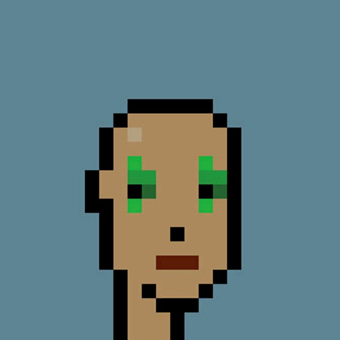 A pixellated figure with green eyes
