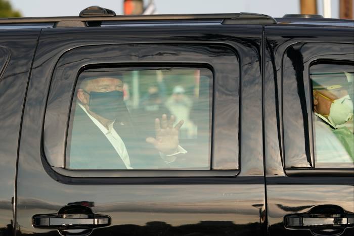 Trump waves to supporters outside Walter Reed hospital this month. Uniquely, the US constitution keeps the incumbent in power for a full 11 weeks between election day and the inauguration of the next president