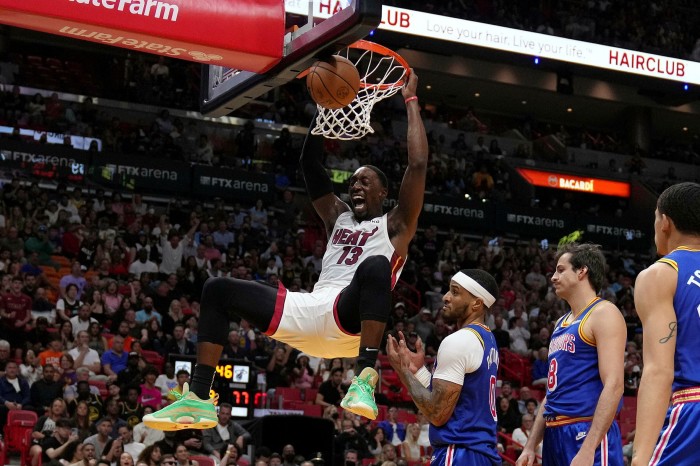 Bam Adebayo of the Miami Heat dunks in the second half against the Golden State Warriors at FTX Arena on March 23 