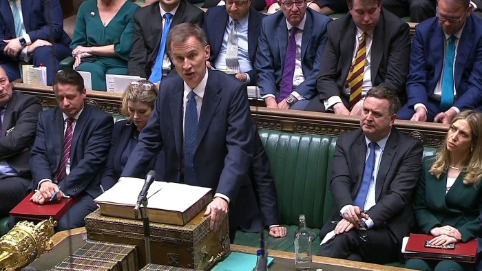 The Chancellor of the Exchequer Jeremy Hunt presents his Autumn Statement in the House of Commons