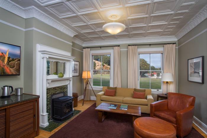 Pretty details like cornices and mullioned windows add charm to the suites