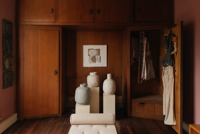 Hugging pots and ‘The Origin of the World’, 2019, by Daniel Reynolds, clothing by House of Gorgeousity, and a Charlotte Perriand Cansado Daybed by Atelier LK Collection in the dressing room, all POA
