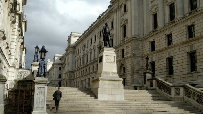 Government offices in London’s Whitehall with a statue of an old soldier