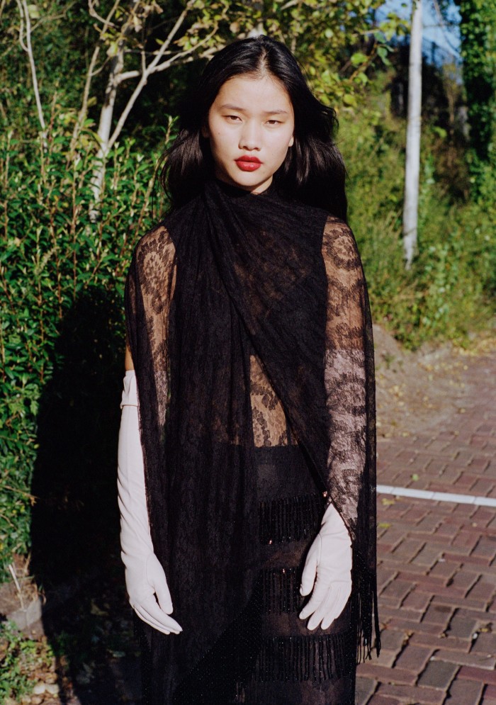 Lanxiang Vermeulen wears Fendi Chantilly-lace and silk dress, £6,100, and leather gloves, £690