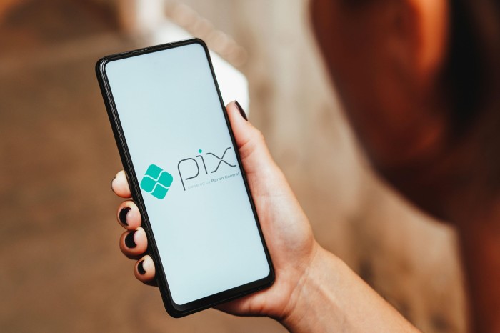 Pix logo is displayed on a smartphone screen
