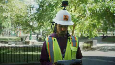 Walk on by: a BlocPower worker scanning buildings for inefficiencies and flaws