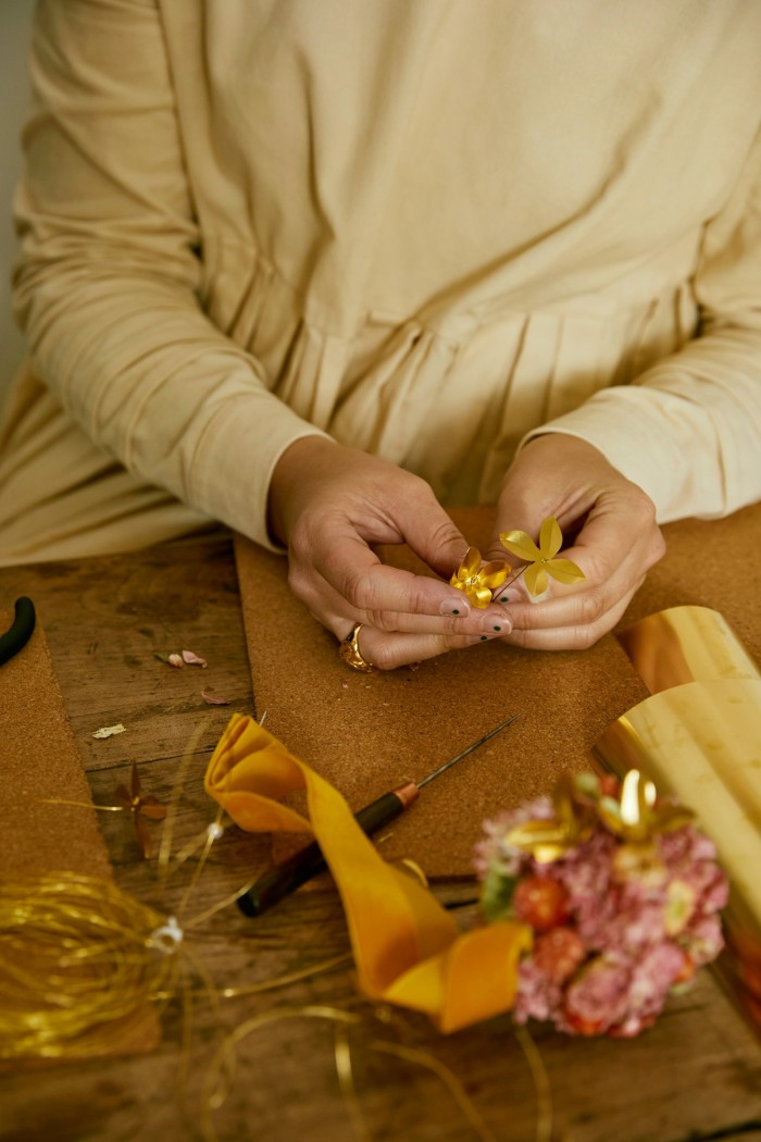 Wheeler preparing an Everlasting Golden Zingara bauble