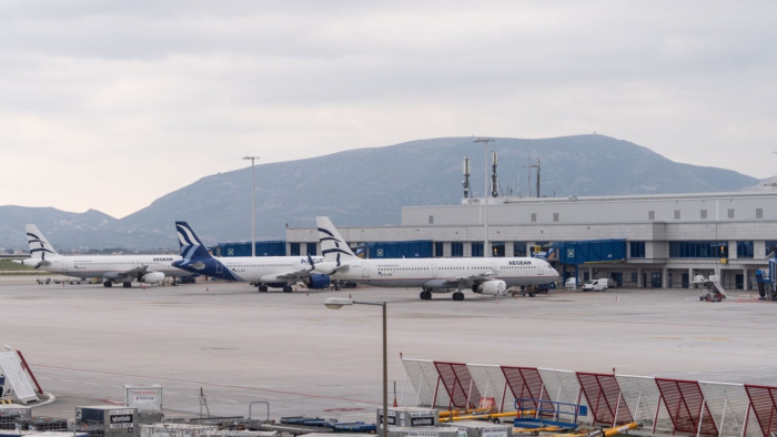 Aegean Airlines SA parked on the Eastern runway of Athens International Airport 