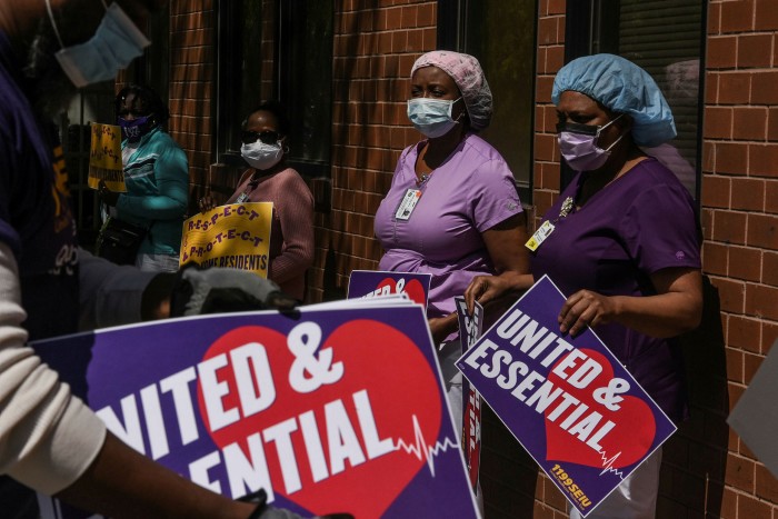 Care home workers hold a vigil in Brooklyn, New York. One of the few qualifications available to people without a college education is a Certified Nursing Assistant diploma, which prepares people for careers in nursing homes