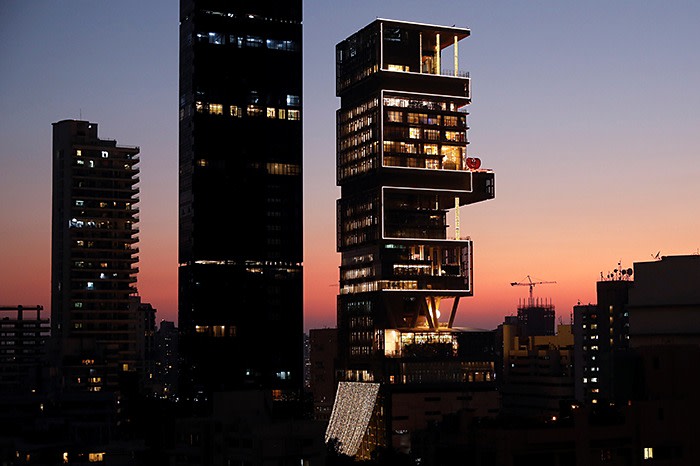 Ambani’s Mumbai home, Antilia, a 27-storey skyscraper complete with a helipad, sports facilities and space for several hundred staff. It is believed to be the world’s most expensive residence with a rumoured price tag as high as $1bn
