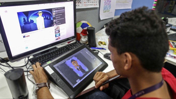 An employee draws a cartoon for the BYJU’S learning app in the media department of the Think and Learn Pvt. office in Bengaluru, India