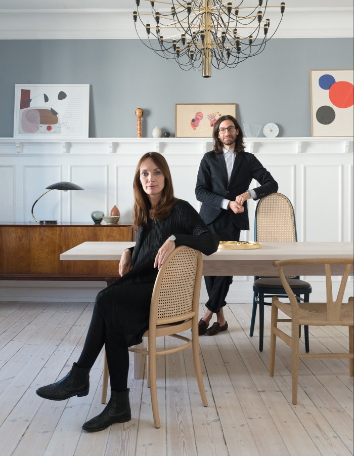 Stine Gam and Enrico Fratesi at home in Copenhagen with their beech and Vienna straw Morris chairs, from €635, for Wiener GTV Design