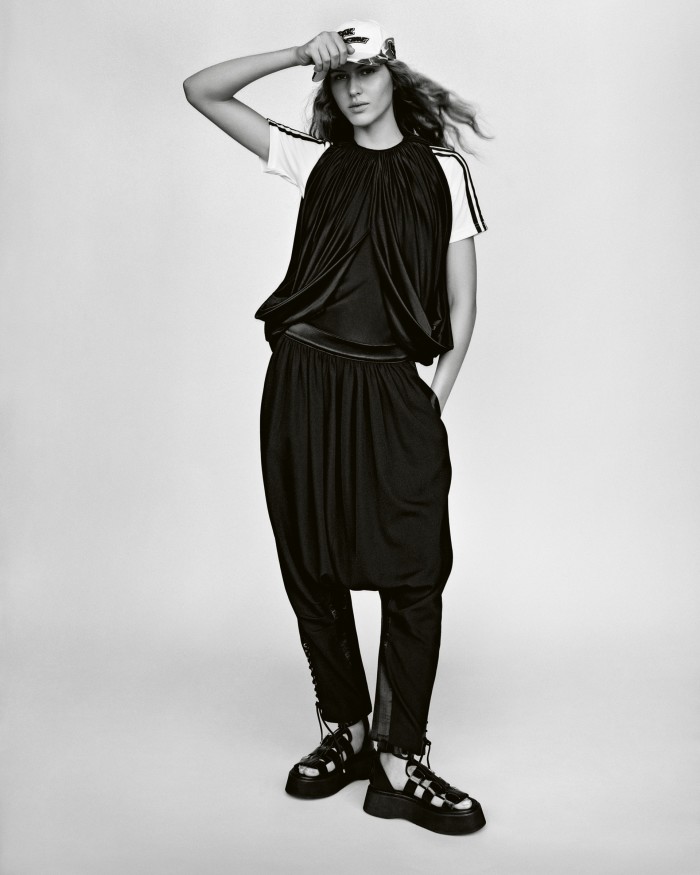 Rabanne jersey draped top, POA, and wool trousers, £1,580. Junya Watanabe leather sandals, £1,019