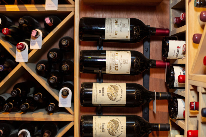 wine bottles stores horizontally on a rack