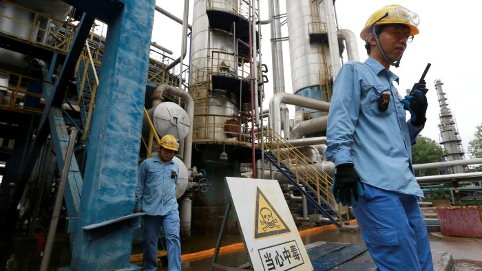 Technicians at a Sinopec refinery in Tianjin
