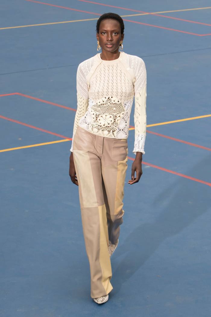 Marine Serre regenerated crochet top, €650, and regenerated leather patchwork trousers, €1,200