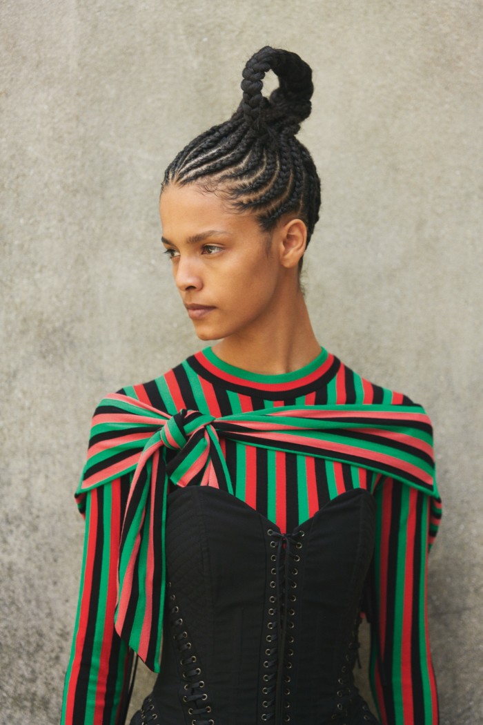 Stripes get a spectacular upgrade. Opposite page: Laiza wears Dolce & Gabbana stretch-fabric and boning lace-up bustier, £2,351. Kenzo cotton jumper and cotton snood, both POA 