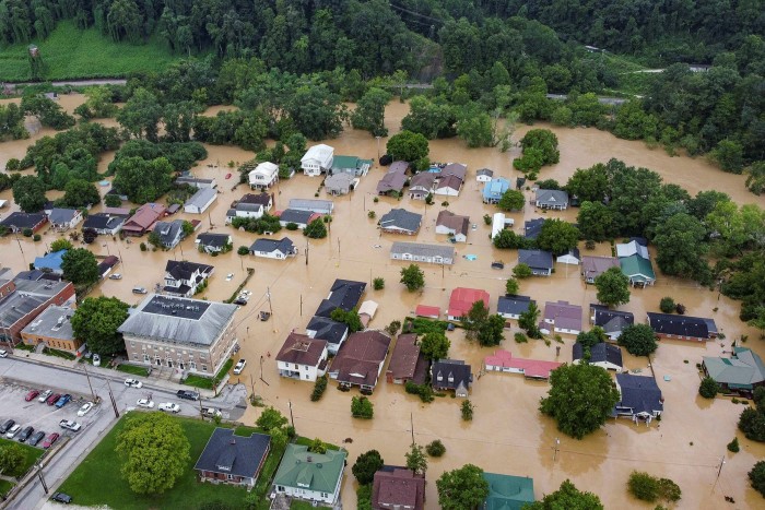 Aerial view of homes submerged under flood waters from the North Fork of the Kentucky River in Jackson, Kentucky, on July 28 2022 