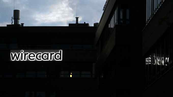The logo of German payments provider Wirecard is seen at a building of the company’s headquarters in Aschheim near Munich in 2020