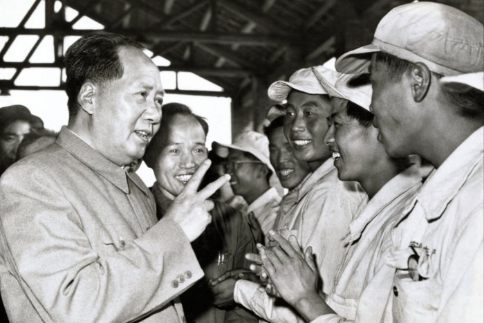Mao Zedong meets workers in a factory