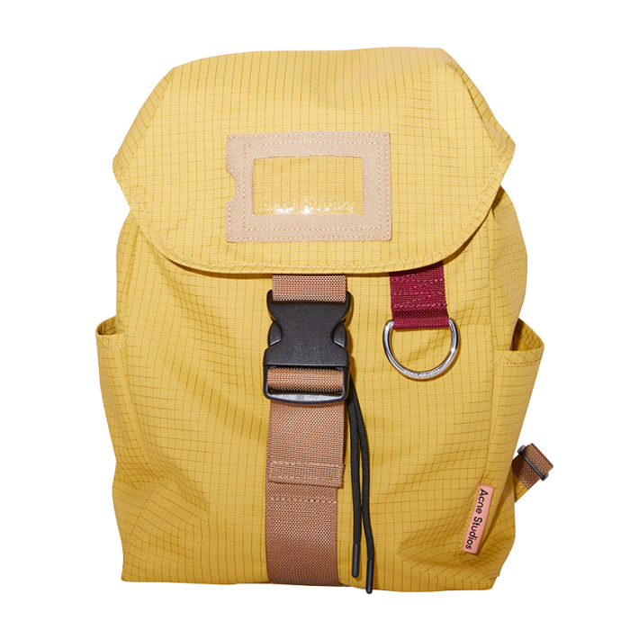 Mustard-yellow Acne backpack, £250
