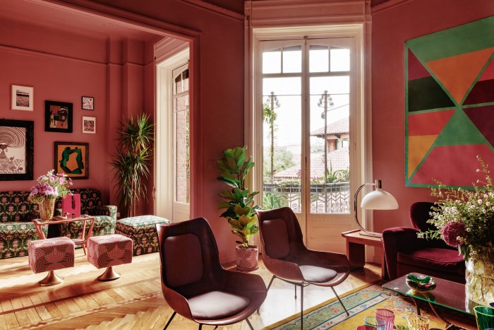 The Milan apartment of designer JJ Martin mixes 1950s furniture and reissued vintage Prada fabric