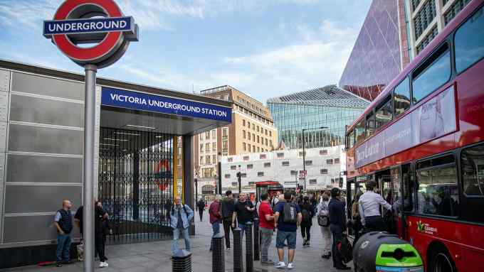 commuters wait for buses outside Victoria station in London during last week’s Tube and rail strike