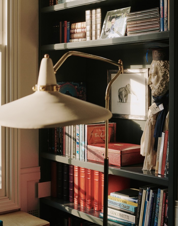 A bookshelf in the drawing room