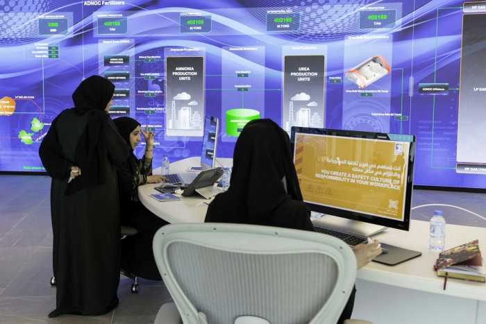 Employees work at the Panorama command centre at the Abu Dhabi National Oil Company. A person close to Sheikh Tahnoon says he is a huge believer in technology, which will help the UEA diversify its economy away from oil