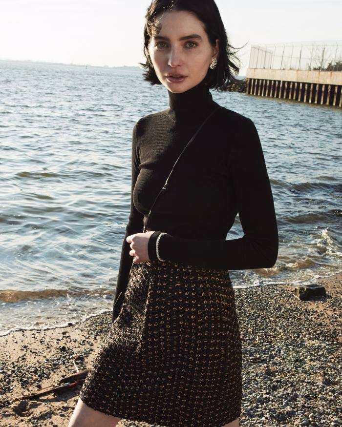 Hanro wool/silk rollneck, £109. Louis Vuitton lurex tweed skirt, $2,080. The Row leather Mini Envelope bag, $550, and leather Multi-Card case, $650. Tiffany & Co High Jewellery platinum and diamond bracelet and earring