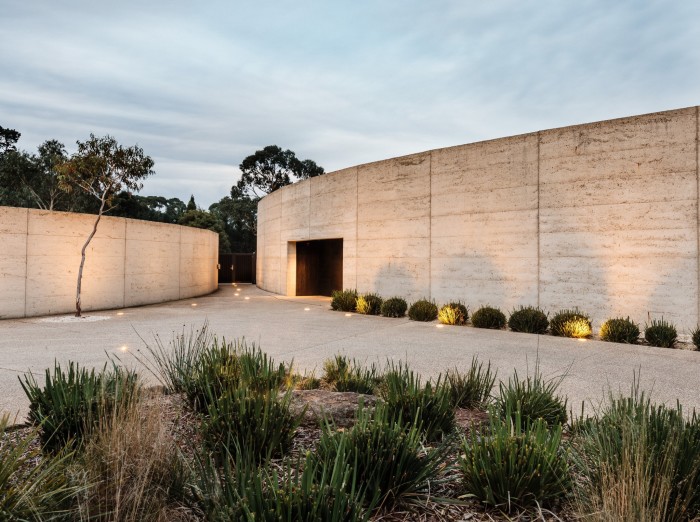 A curved, windowless, limestone section of Port Phillip Estate’s main building