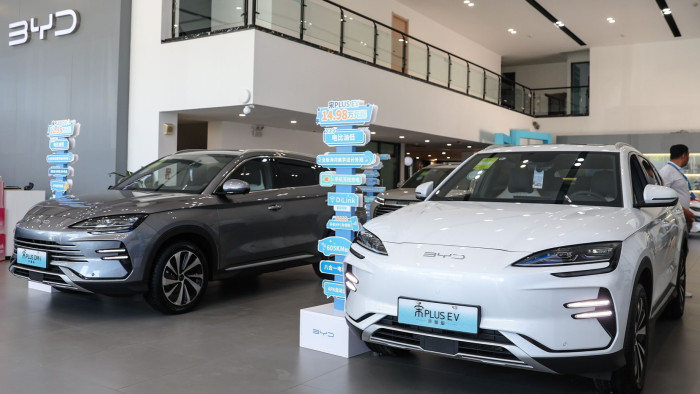 BYD electric cars on display in a BYD showroom