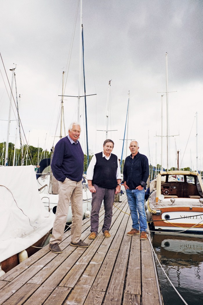 Tom and Matthew Richardson with boat designer Nigel Irens (middle)