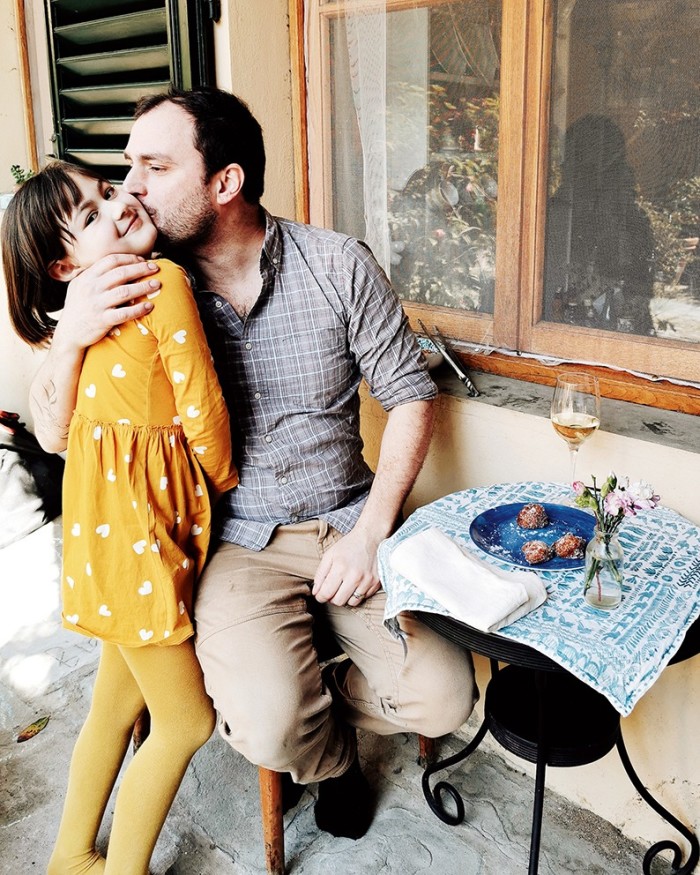 Davies’ husband Marco and Mariù with rice fritters that she made for Father’s Day – they are a tradition on the day in Italy (19 March)