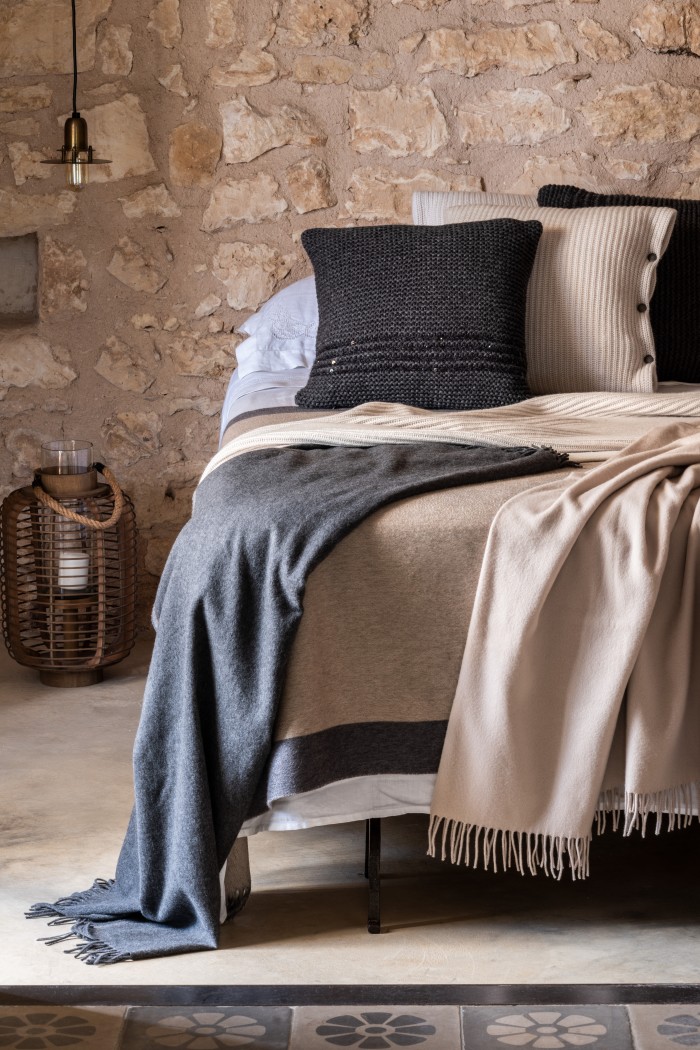 Brunello Cucinelli silk double-cloth Shiny Dreamer throw, £920, and cashmere plaid with fringe and contrast border, £1,810