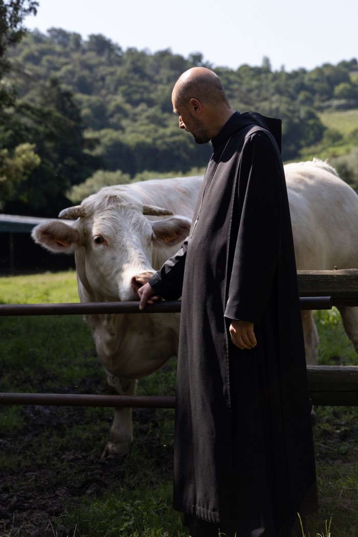 The abbot with one of the Abbazia’s livestock