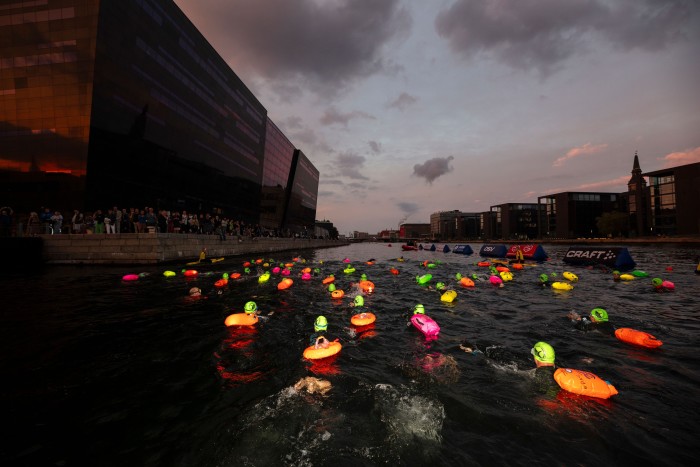 The multicoloured spectacle of the night swim in Copenhagen