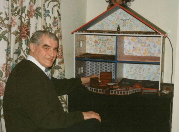 Maria’s grandfather Sam Fitzpatrick making a dolls’ house for his grandchildren